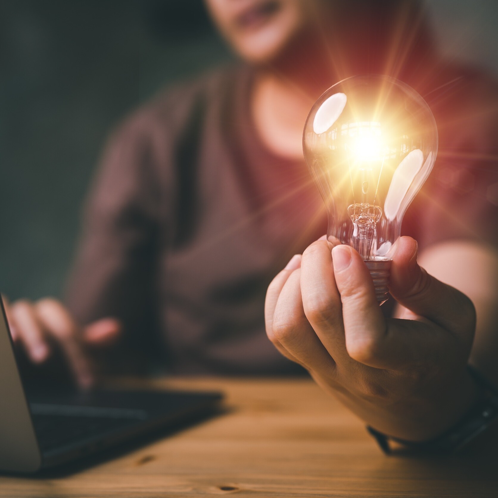 Pioneer Talent Image showing a lightbulb illuminating a dark room